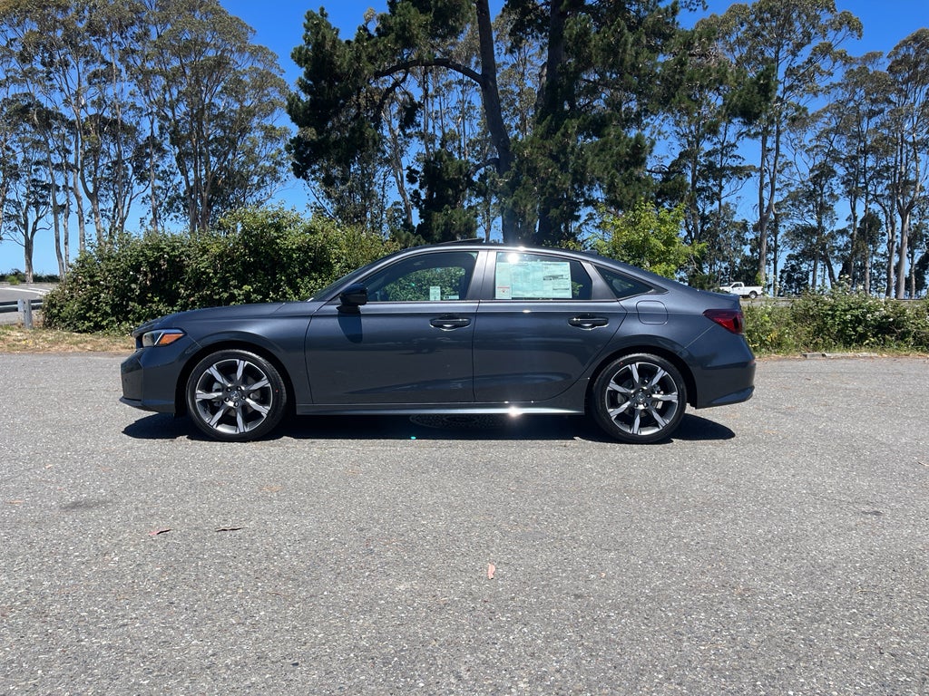 2026 Honda Civic Hybrid Sport Touring in Meteorite Gray Metallic — front three-quarter view