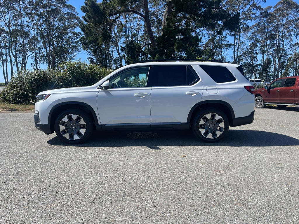 2026 Honda Pilot Elite in Platinum White Pearl — front three-quarter view