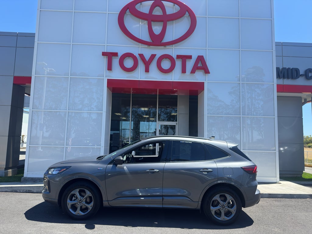 2024 Ford Escape ST-Line in Carbonized Grey Metallic — front three-quarter view