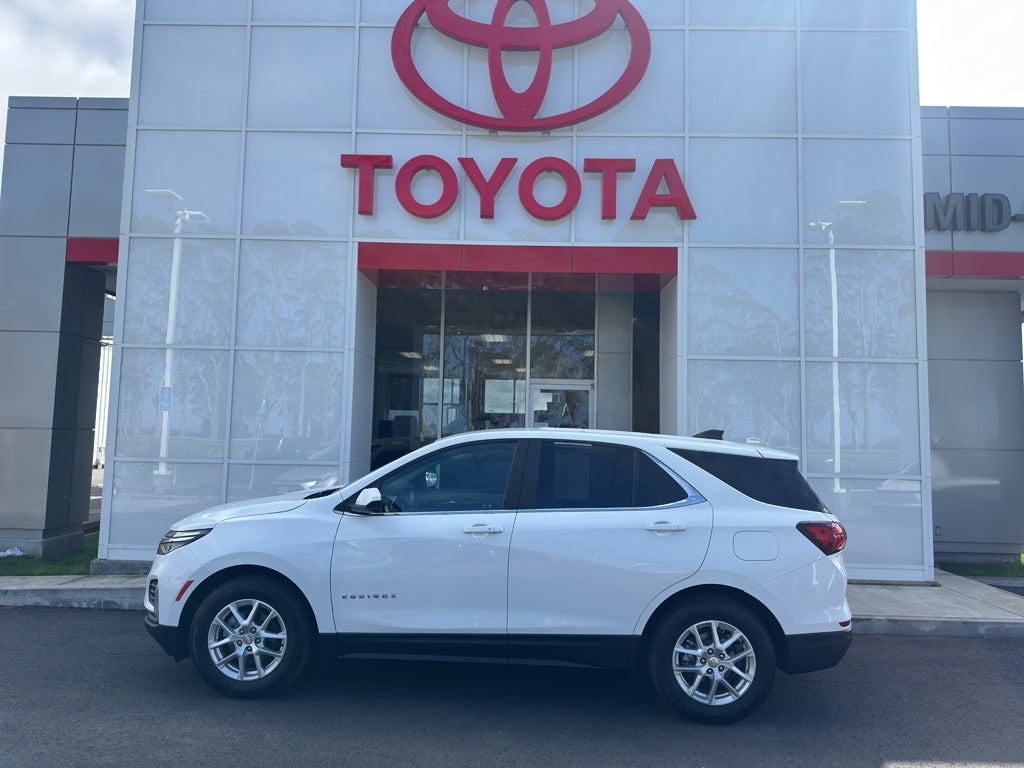 2023 Chevrolet Equinox LT in Summit White — front three-quarter view