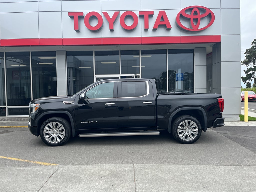 2021 GMC Sierra Denali in Onyx Black — front three-quarter view