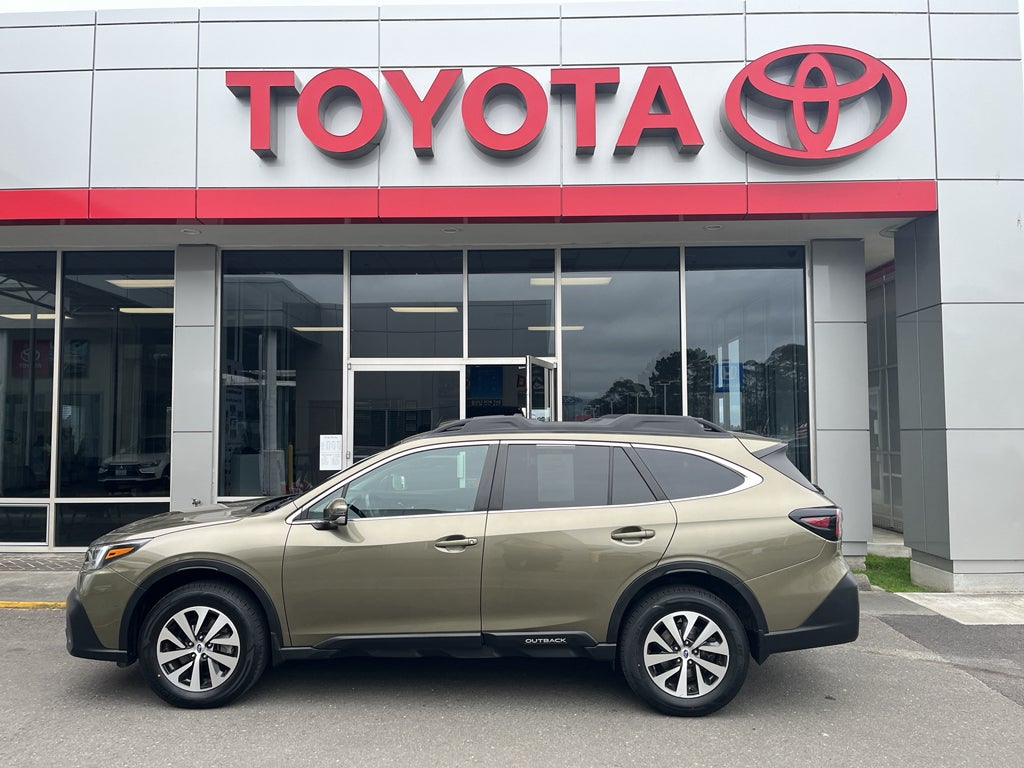 2021 Subaru Outback Premium in Autumn Green Metallic — front three-quarter view