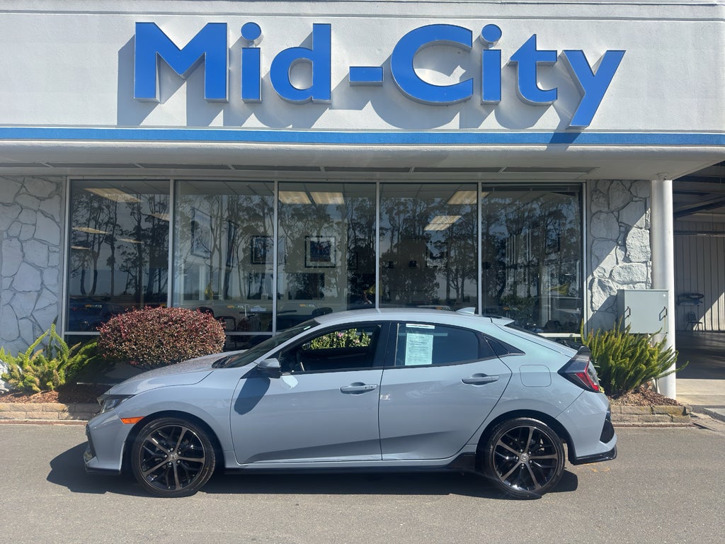 2021 Honda Civic Sport in Sonic Gray Pearl — front three-quarter view