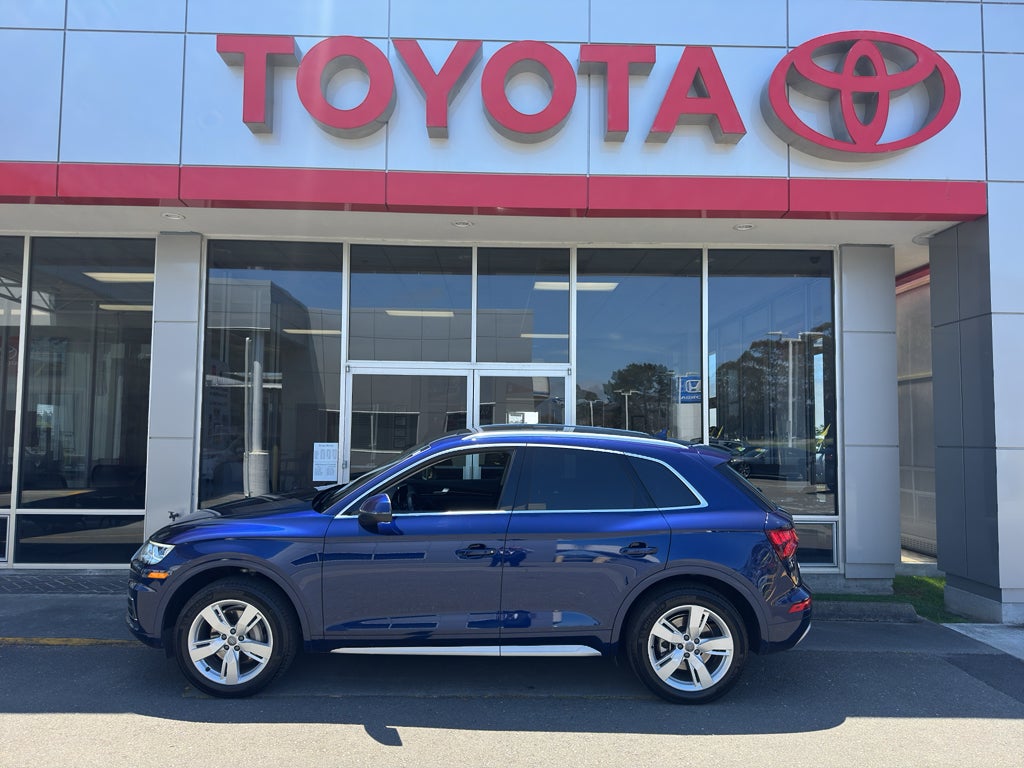 2018 Audi Q5 Premium Plus in Navarra Blue Metallic — front three-quarter view