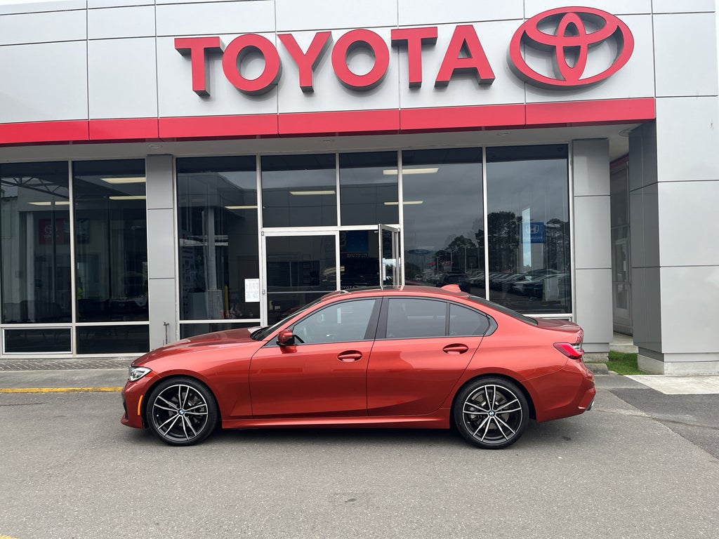 2019 BMW 330i 330i in Sunset Orange Metallic — front three-quarter view